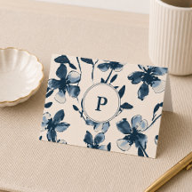 Vouwpapier met monogram en blauwe bloemen