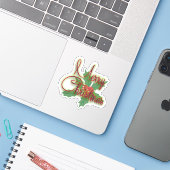 Vrolijk kerstcadeauscript en groen sticker (Laptop met iPhone)
