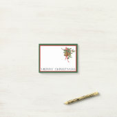 Vrolijk kerstcadeautje en Holly Post-it Notes (Op bureau)
