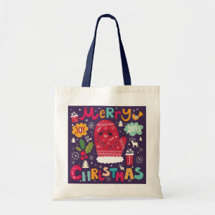 Vrolijk kerstcadeautje met kleurrijke tekst en ker tote bag