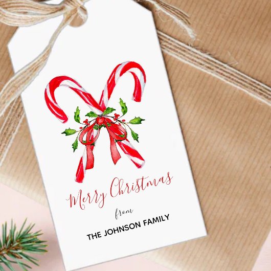 Vrolijk kerstsnoepsuikerriet met Holly-bladeren Cadeaulabel