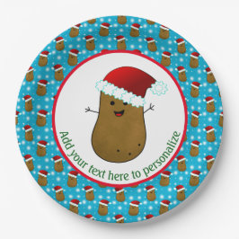 Vrolijke kerstaardappel met een kersthat papieren bordje