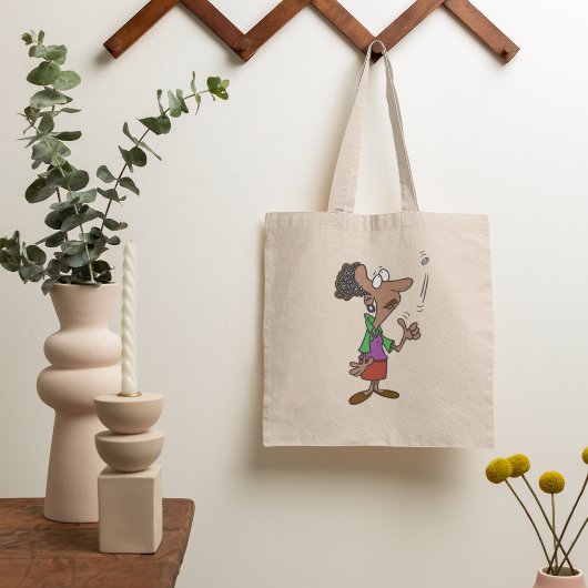Vrouw die een muntstuk voert tote bag