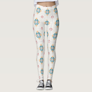 Vrouw draagt witte legging met een kleurrijk