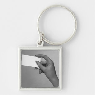 Vrouw Holding-kaart Sleutelhanger