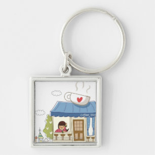 Vrouw in een koffiewinkel sleutelhanger