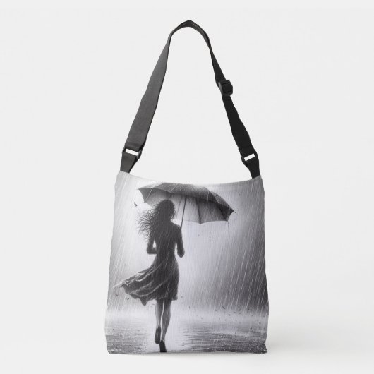 Vrouw loopt rustig in de regen met paraplu crossbody tas (Voorkant)
