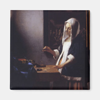 Vrouw met een evenwicht magneet