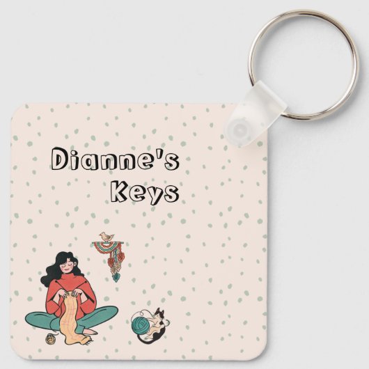 Vrouwelijke breiende kat, laten we het hebben over sleutelhanger (Achterkant)