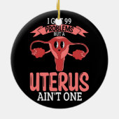 Vrouwen 99 problemen, maar een baarmoeder ain_t éé keramisch ornament (Achterkant)
