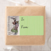  vrouwen die kerstcadeaulabel voor Label kopen (Insitu)