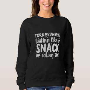 Vrouwen verscheurd tussen eruit zien als een snack trui