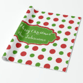 Vun kerstpokadots in rood en groen cadeaupapier (Uitgerold)