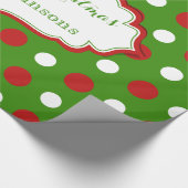 Vun kerstpokadots in rood en wit cadeaupapier (Hoek)