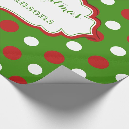 Vun kerstpokadots in rood en wit cadeaupapier (Hoek)