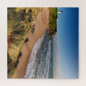 Vuurtoren aan het strand legpuzzel (Horizontaal)