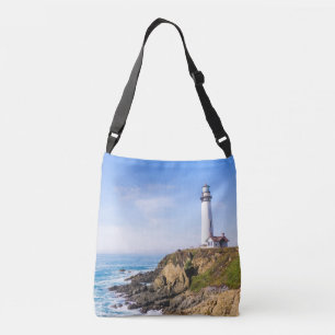 vuurtoren op heuvelblauwe hemel witte dakoceaan crossbody tas