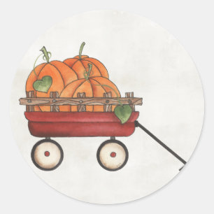 Wagon vol met pompoenen ronde sticker