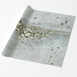 Wand van beton, gekraakt, met kleine stenen cadeaupapier