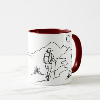 Wandelaar in woestijn mok met John Muir citaat