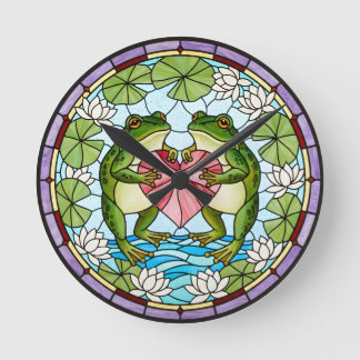 Wandklok met twee kikkers die een hart vasthouden ronde klok