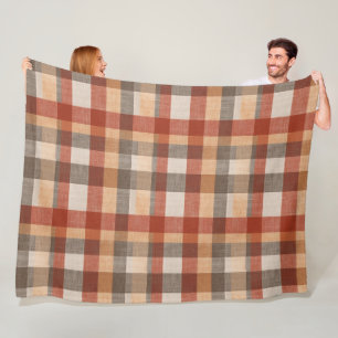 Warme herfst geruite stoftextuur in roest en beige fleece deken