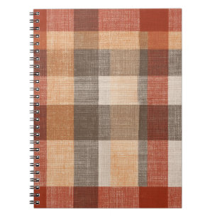 Warme herfst geruite stoftextuur in roest en beige notitieboek
