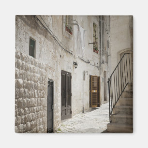 Wasgoed dat in een steegje in Italië droog is Magneet