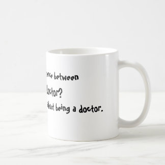 Wat is het verschil tussen God en een dokter?.. Koffiemok