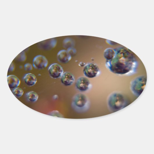 Waterdruppels in beweging ovale sticker (Voorkant)