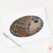 Waterdruppels in beweging ovale sticker (Envelop)