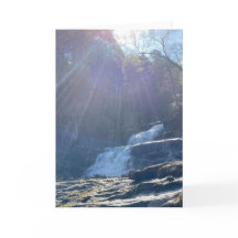 Waterval, rotsen & zonnestralen