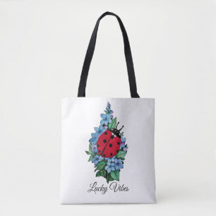 Waterverf luivogel met blauwe wilde bloemen draagtas