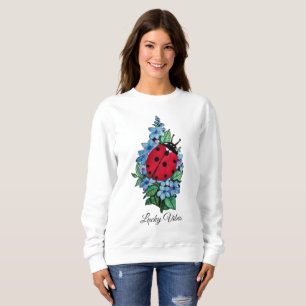 Waterverf luivogel met blauwe wilde bloemen trui