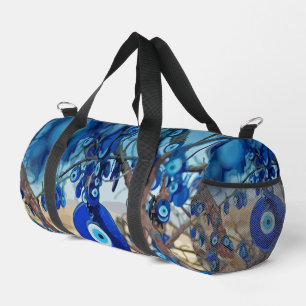 Waterverf van met nazars gedecorbeerde bomen plunjezak