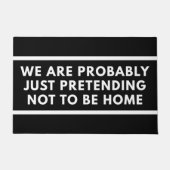 We doen waarschijnlijk gewoon alsof we niet thuis  deurmat (Voorkant)