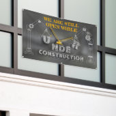 We staan nog open terwijl we in aanbouw zijn spandoek (Buitenkant Gebouw)