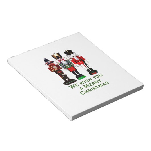 We wensen u een prettige kerstkrakers. notitieblok (Schuin)