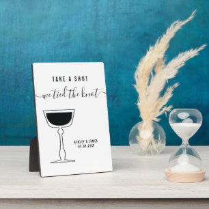 Weddenschap, neem een foto van de Knot-tafel. Fotoplaat