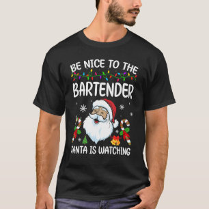 Wees aardig tegen de barman die kerstman kijkt naa t-shirt