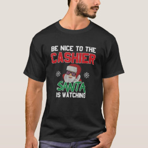 Wees aardig tegen de kassier die de Kerstman kijkt T-shirt