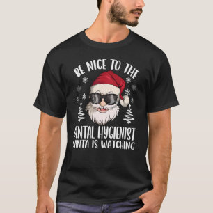 Wees aardig tegen de tandheelkundige kerstman. t-shirt