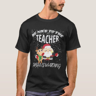 Wees aardig voor de juf Kerstman met selfie kijkt T-shirt