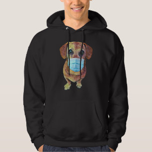 Weiner hond met een masker op hoodie