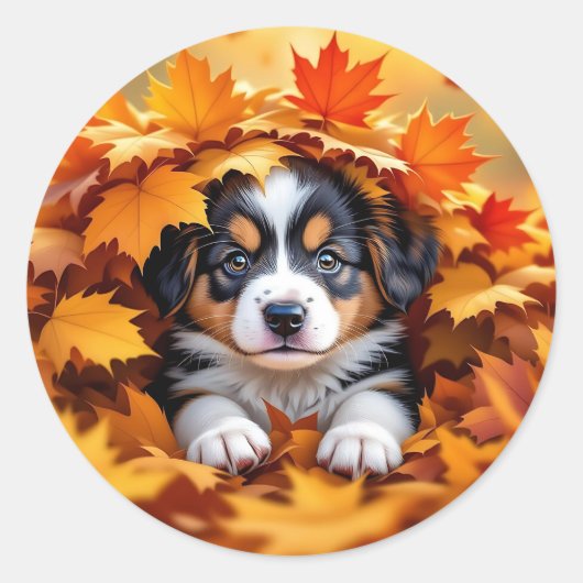 Welpje in herfstbladeren ronde sticker (Voorkant)