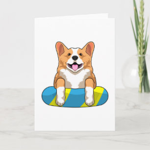 Welshe Corgi tijdens zwemmen met zwembord Kaart
