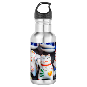 Wenkende kattenbeeldjes waterfles