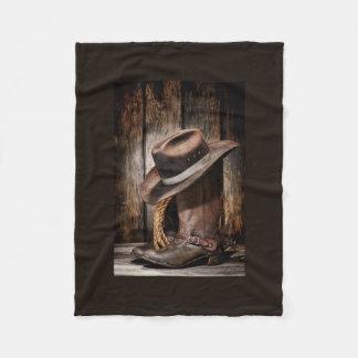 western land met bruine schuur en cowboylaarzen fleece deken