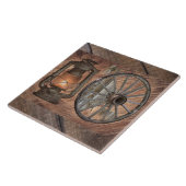 Westerne kolenolielamp en zwoerd tegeltje (Zijkant)