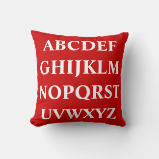 WHITE ALPHABET op rode kussen